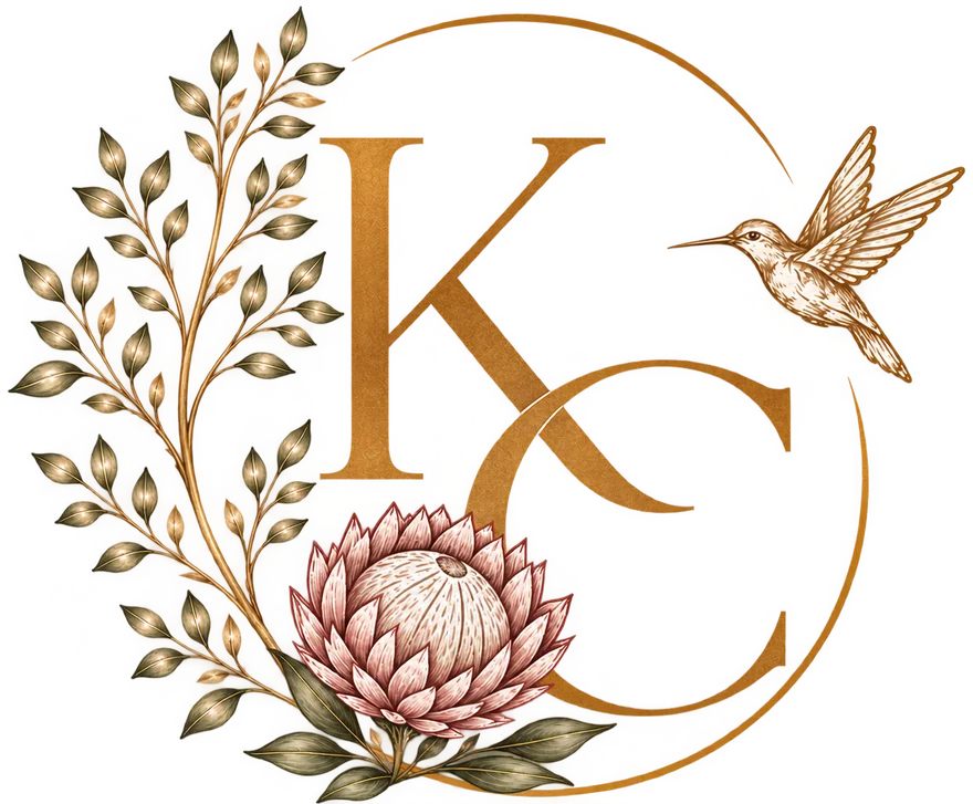 The KC monogram: a protea, a sprig of leaves and a hummingbird inside a gold circle